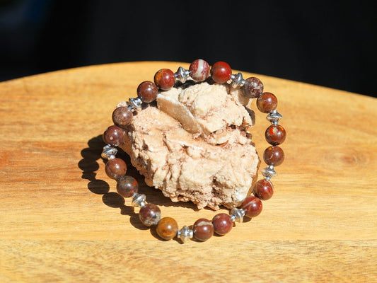 Red Brecciated Jasper bracelet with Tibetan Style Alloy Pearl Spacer Discs. Tibetan alloy material in antique silver.