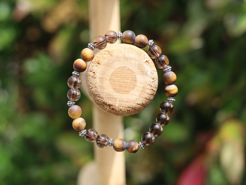 Natural Tiger Eye, Frosted Style Beads with Smoky Quartz Stones. And Tibetan alloy material in antique silver. Exquisite workmanship
