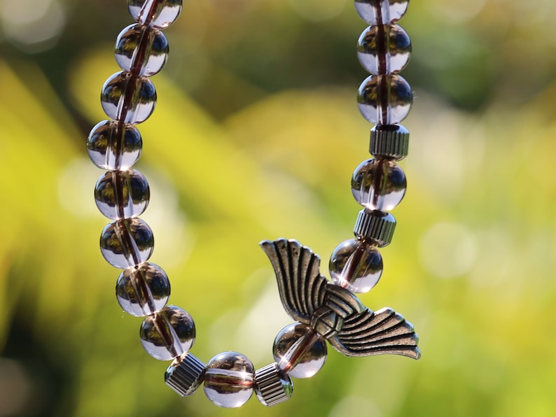 Smoky Quartz Stone bracelet with Angel Wings Beads and Stainless Steel Beads Gold Color.  can serve as a reminder of divine presence
