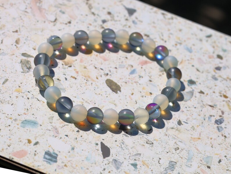 Cool Mystic Aura Quartz Beads with White opal bracelets. Mystic Aura Quartz can enhance spiritual growth, promote clarity of thought