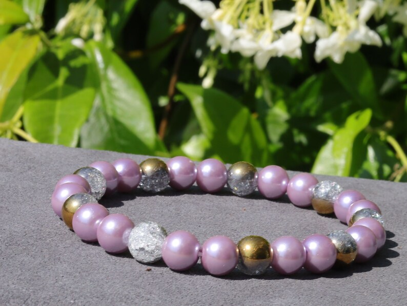Genuine Purple South Sea Shell Pearl bracelet combined with White Snow Cracked Crystal Quartz. using the inner lining of a mollusk shell