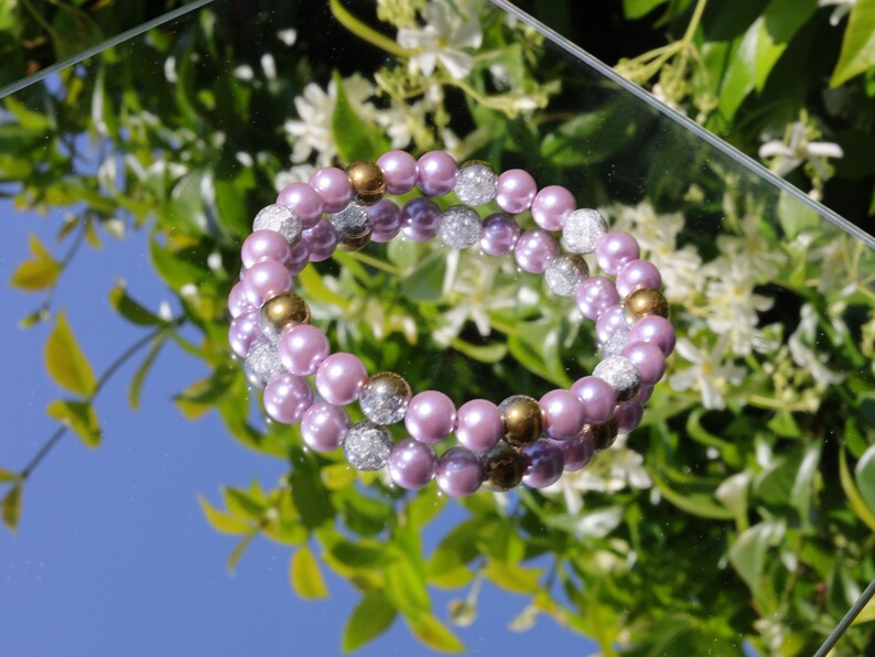 Genuine Purple South Sea Shell Pearl bracelet combined with White Snow Cracked Crystal Quartz. using the inner lining of a mollusk shell