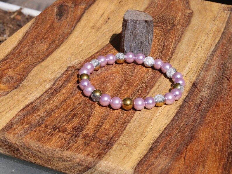 Genuine Purple South Sea Shell Pearl bracelet combined with White Snow Cracked Crystal Quartz. using the inner lining of a mollusk shell