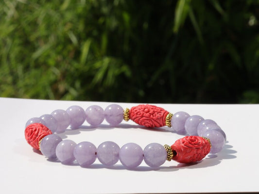 Carved Cinnabar Beads with rare Lepidolite  and  Tibetan Style Alloy Spacer Discs. minerals such as quartz, feldspar, and tourmaline