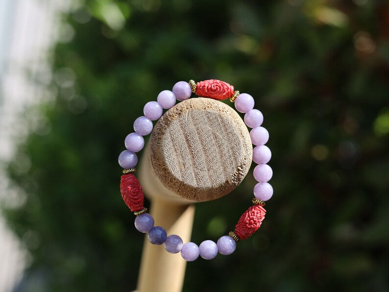 Carved Cinnabar Beads with rare Lepidolite  and  Tibetan Style Alloy Spacer Discs. minerals such as quartz, feldspar, and tourmaline