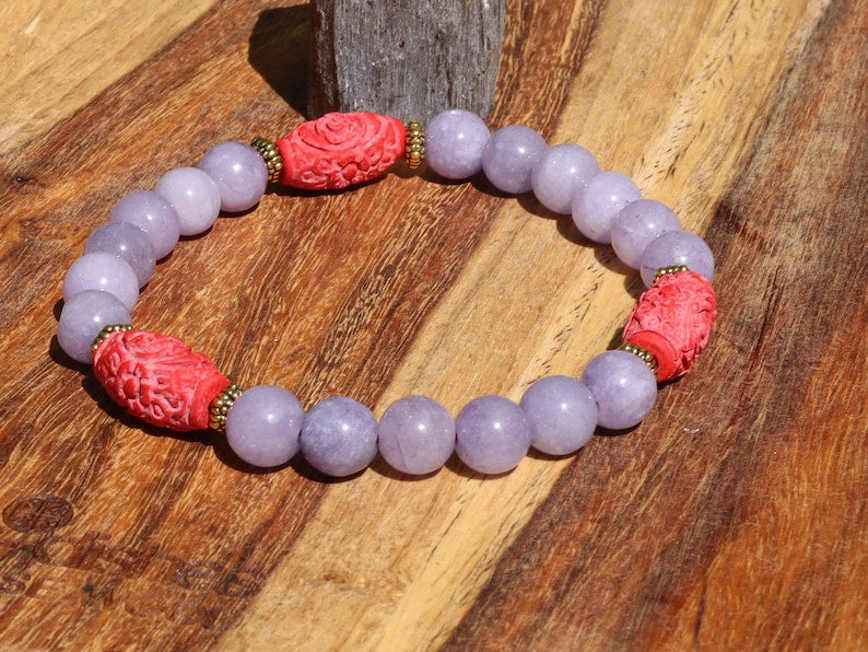 Carved Cinnabar Beads with rare Lepidolite  and  Tibetan Style Alloy Spacer Discs. minerals such as quartz, feldspar, and tourmaline