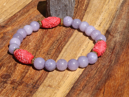 Carved Cinnabar Beads with rare Lepidolite  and  Tibetan Style Alloy Spacer Discs. minerals such as quartz, feldspar, and tourmaline