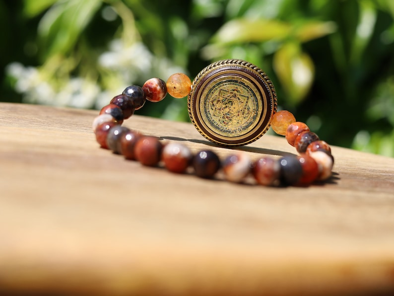 Unique, one of a kind Fire Crackle Agate bracelet with Ethnic Handmade Nepal Pendant God Of Wealth. bodhi, jade line, copper, sandalwood