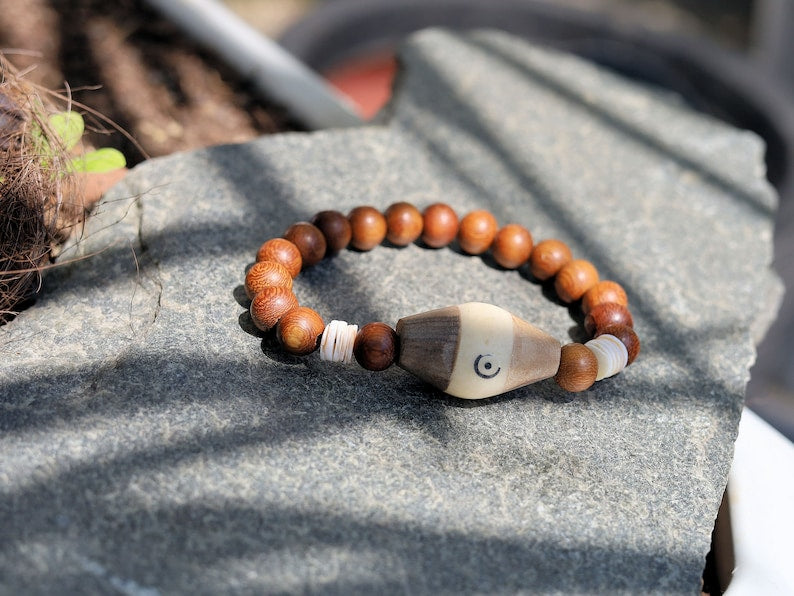 Beautiful, large handmade Tribal Batik-Bone bead from Kenya with Madre de Cacao Wood beads and Ostrich Egg shell Eggshell Beads