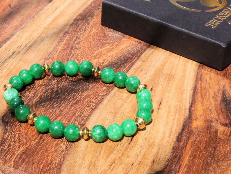 Natural Green Lace Jade with Tibetan Style Alloy Spacer Discs. is associated with balancing emotions, promoting harmony