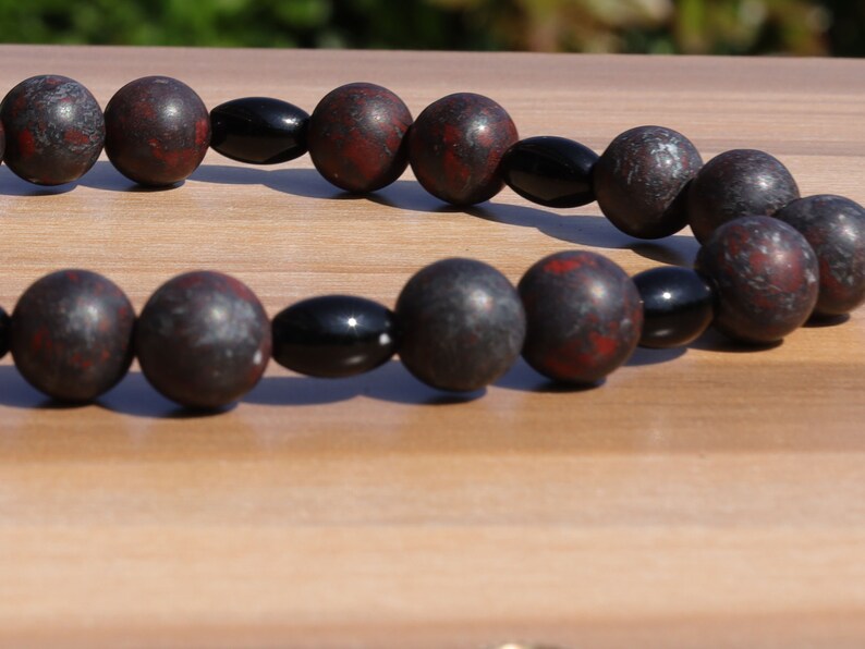 Safflower Jasper bracelet with Natural Black Agate Barrel Beads 6mm x 9mm. The art of expressing your taste and style. handmade gifts