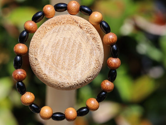 Unique Madre de Cacao Wood bracelet combined with Natural Black Agate Barrel Beads. Most favored botanical medicines in South America