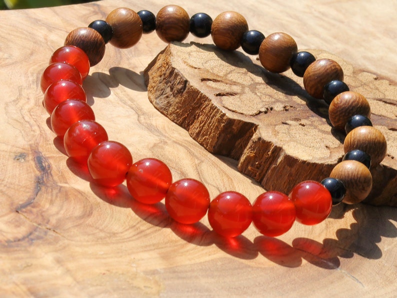 Unique Madre de Cacao Wood bracelet combined with Carnelian red beads. And Black Round Natural Wood Beads. unique style