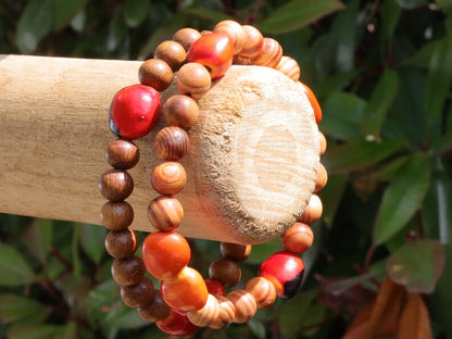 Wooden Bracelet set.  Madre de Cacao Wood beads with 5x Huayruro grande.  Raja Kayu matte beads with 5x Huayruro grande