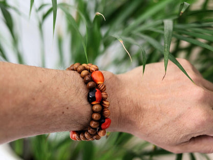 Wooden Bracelet set.  Madre de Cacao Wood beads with 5x Huayruro grande.  Raja Kayu matte beads with 5x Huayruro grande