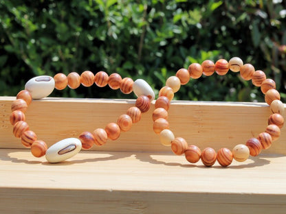 Wooden Bracelet Set. Raja Kayu matte beaded bracelets with Acai broken white seeds and Huayruro white 20mm seeds beads.