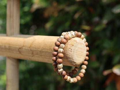 Wooden Bracelet set. Madre de Cacao Wood beads and Wooden beads with spiral. can represent growth, progression, and transformation