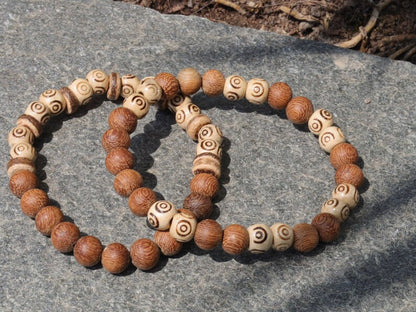 Wooden Bracelet set. Madre de Cacao Wood beads and Wooden beads with spiral. can represent growth, progression, and transformation