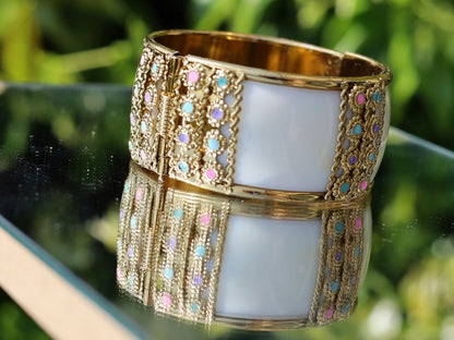 Kriaa Gold Plated Multicolor Stone Kada. Indian jewelry is known for its intricate designs and rich cultural significance.