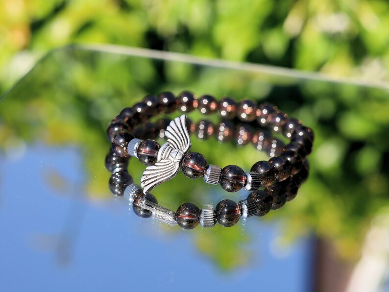 Smoky Quartz Stone bracelet with Angel Wings Beads and Stainless Steel Beads Gold Color.  can serve as a reminder of divine presence