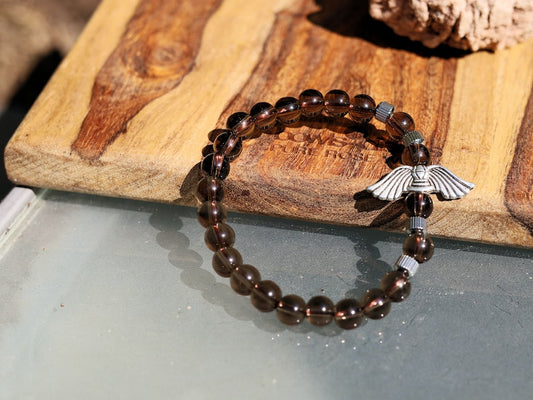 Smoky Quartz Stone bracelet with Angel Wings Beads and Stainless Steel Beads Gold Color.  can serve as a reminder of divine presence