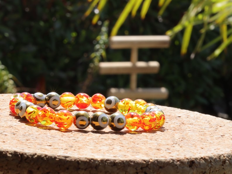 Yellow/Red acrylic beads with Electroplate Glass Beads Strands, Round with Evil Eye Pattern, gold color. protecting the wearer from harm