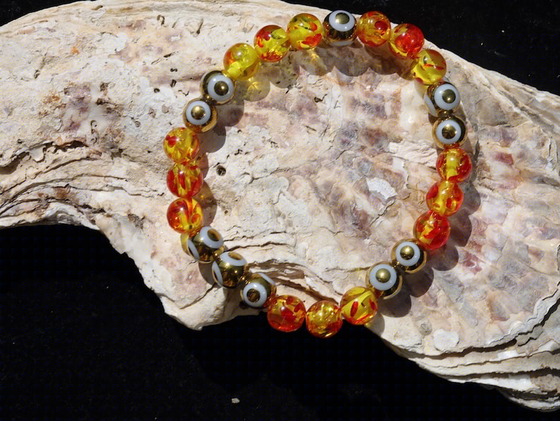 Yellow/Red acrylic beads with Electroplate Glass Beads Strands, Round with Evil Eye Pattern, gold color. protecting the wearer from harm