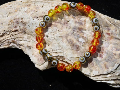 Yellow/Red acrylic beads with Electroplate Glass Beads Strands, Round with Evil Eye Pattern, gold color. protecting the wearer from harm