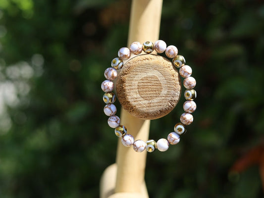 Electroplate Glass Beads, Evil eye bracelet and White Turquoise Gold Color Wire Pine beads. With love, care and a little magic.