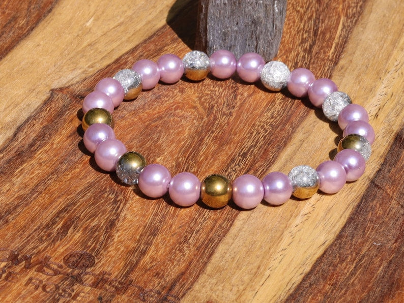 Genuine Purple South Sea Shell Pearl bracelet combined with White Snow Cracked Crystal Quartz. using the inner lining of a mollusk shell