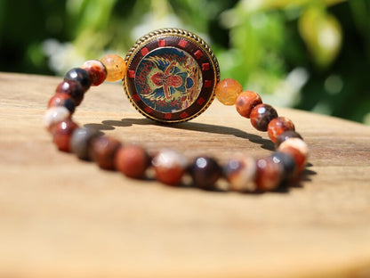 Unique, one of a kind Fire Crackle Agate bracelet with Ethnic Handmade Nepal Pendant God Of Wealth. bodhi, jade line, copper, sandalwood