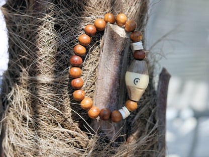Beautiful, large handmade Tribal Batik-Bone bead from Kenya with Madre de Cacao Wood beads and Ostrich Egg shell Eggshell Beads