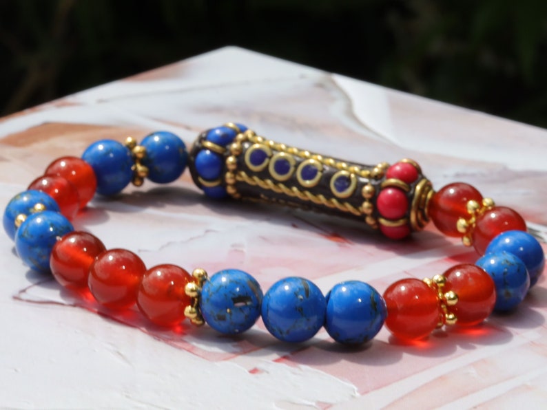 Blue Turquoise Shell Howlite beads and  Carnelian stones. Jewelry is a powerful way to express your individuality and unique style