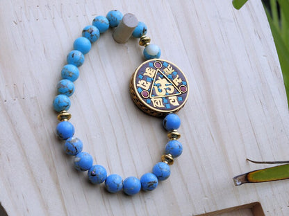Unique bi color Blue Gold Turquoises Agate bracelet. Combined with Handmade Indonesia Bead,  Nickel Free, Flat Round with Om Symbol