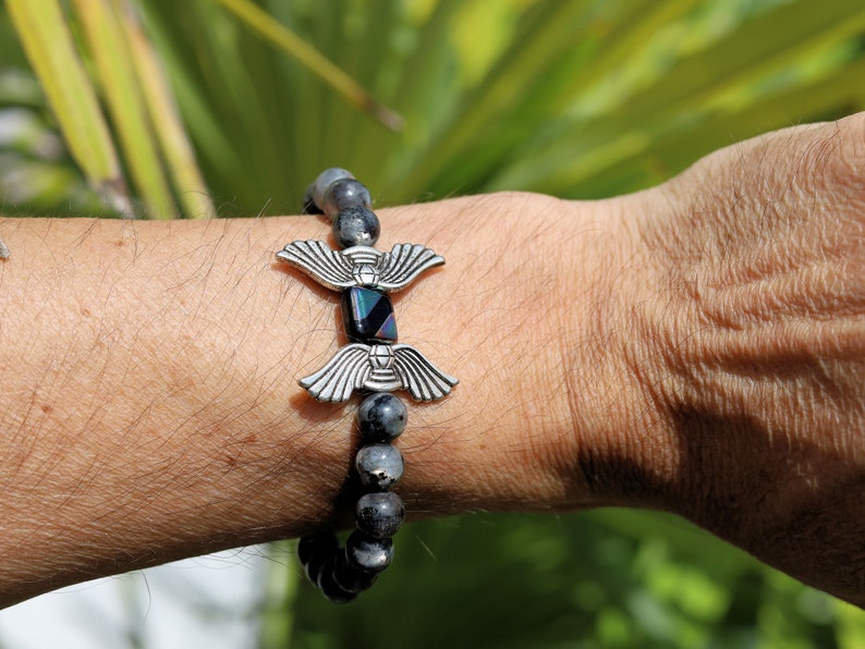 Angel Wings Beads combined with Labradorite. Angel wing beads in jewelry can hold personal significance and symbolism for individuals