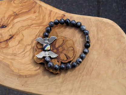Angel Wings Beads combined with Labradorite. Angel wing beads in jewelry can hold personal significance and symbolism for individuals