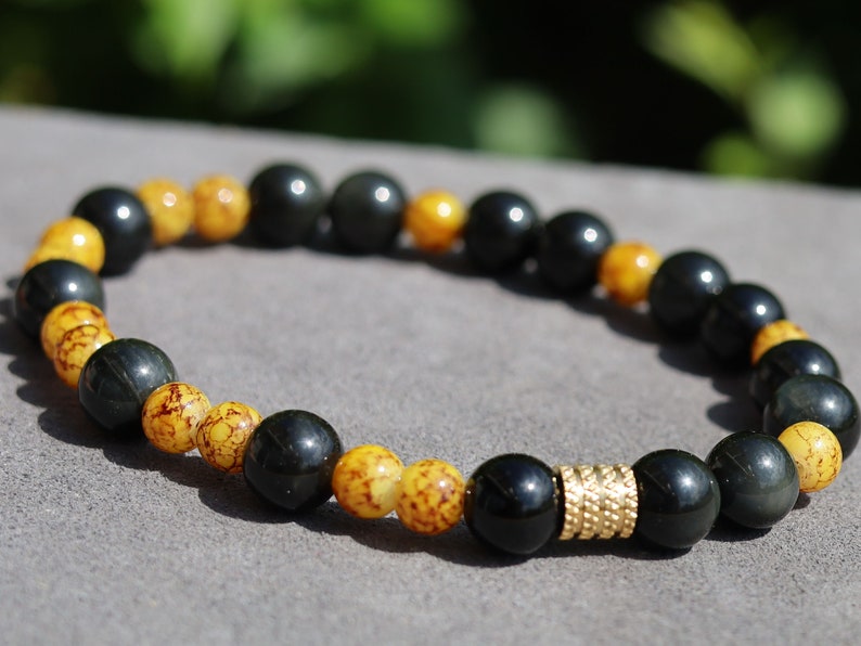 Beautiful Marble-look Glass beads with Obsidian beads. helping to shield against negative energies and promoting grounding and balance