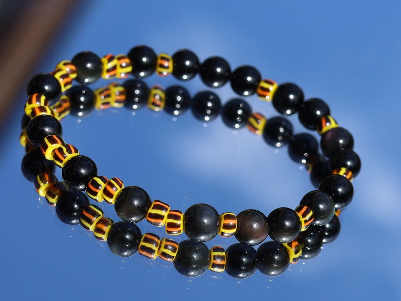 Antique African tradebeads - originally made in Europe (Bohemia) with Obsidian beads. possess protective qualities