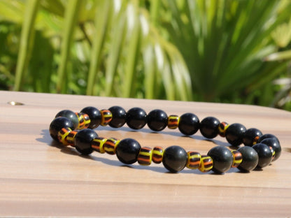 Antique African tradebeads - originally made in Europe (Bohemia) with Obsidian beads. possess protective qualities