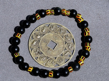 Antique African tradebeads - originally made in Europe (Bohemia) with Obsidian beads. possess protective qualities