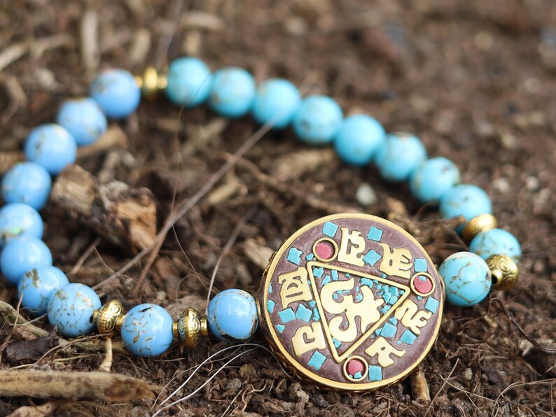 Unique bi color Blue Gold Turquoises Agate bracelet. Combined with Handmade Indonesia Bead,  Nickel Free, Flat Round with Om Symbol