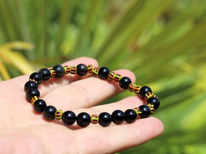 Antique African tradebeads - originally made in Europe (Bohemia) with Obsidian beads. possess protective qualities