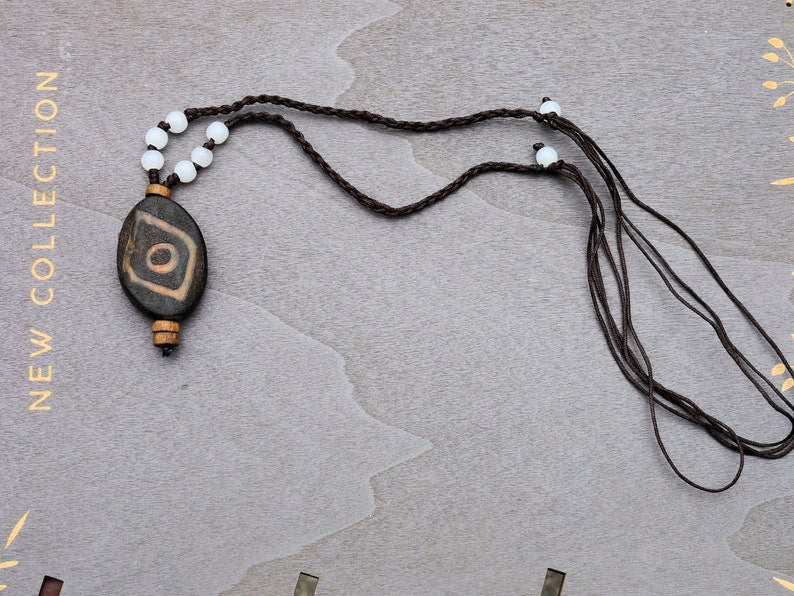 Rare Agate Tibetan 2 Eye DZI pendant. With Hand Knotted Adjustable Cord String Necklace. will be full of unity, harmony and happy feelings.
