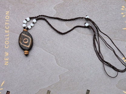 Rare Agate Tibetan 2 Eye DZI pendant. With Hand Knotted Adjustable Cord String Necklace. will be full of unity, harmony and happy feelings.