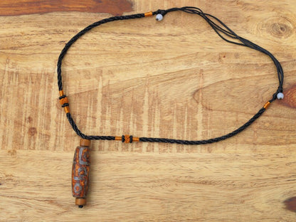 Rare Agate Tibetan 9 Eye DZI pendant. With Hand Knotted Adjustable Cord String Necklace. a wide range of positive and beneficial attributes