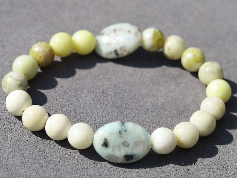 Yellow Turquoise bracelet with A beautiful set of 2 oval beads: real Kiwi Jasper. Yellow Turquoise enhances intuition and personal power.