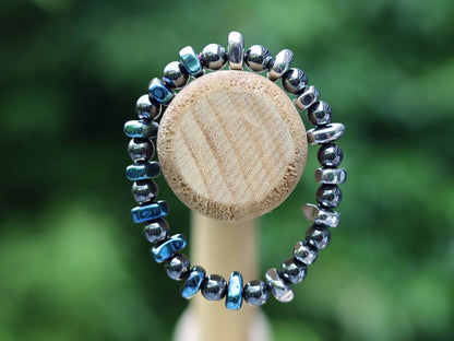 Hematite bracelets with Dzi beads, Heishi beads and Sea Sediment Jasper. Chakra Alignment and grounding.