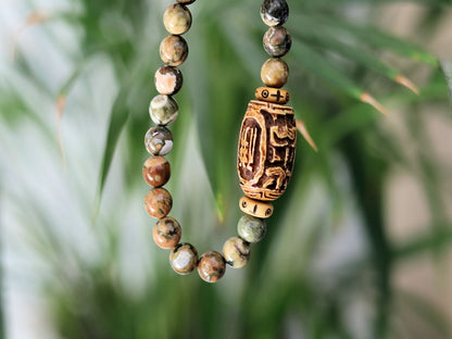 Serene Kambaba Jasper bracelet combined with A very nice, very large bone bead  and beautiful Oxbone Tibetan prayerbeads