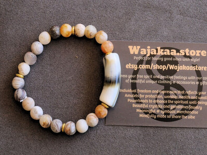 Bamboo leaf agate, also known as bamboo agate or bamboo jasper. Bracelet with acrylic tube bead. Tibetan Style Alloy Spacer Discs.