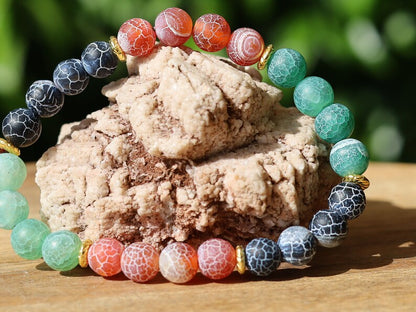 Top black,red and green Frosted Fire Crackle Agate bracelet with Tibetan Style Alloy Spacer Discs.The art of expressing your taste and style